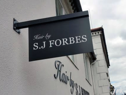 Projecting Signs for Sj Forbes