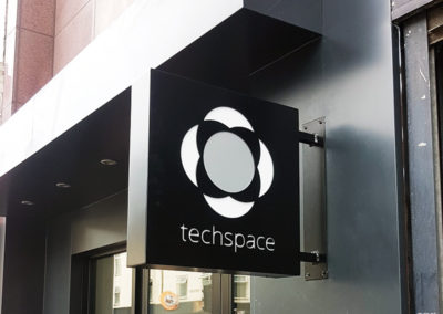 Projecting Signs for Tech Space