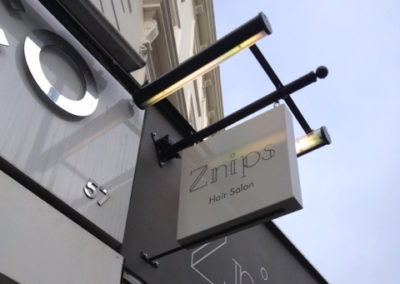 Projecting Signs for Znips Hair Salon