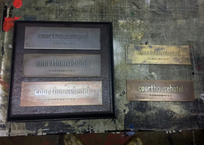 Reverse Etched Brass Plaques - Court House Hotel