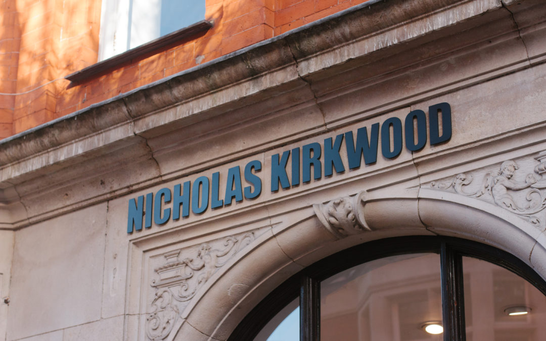 Laser-cut raised lettered signage for Nicolas Kirkwood