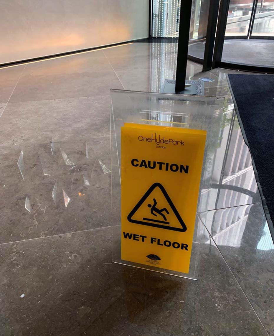 Front View of Bespoke Acrylic Wet Floor Sign for OneHydePark